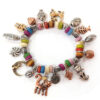 Vintage metal multi charm and bead mix stretch bracelet - cat